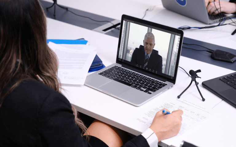 A lawyer participates in a remote videoconference