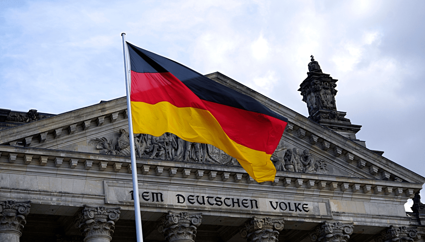 German flag in front of building during international deposition in Germany