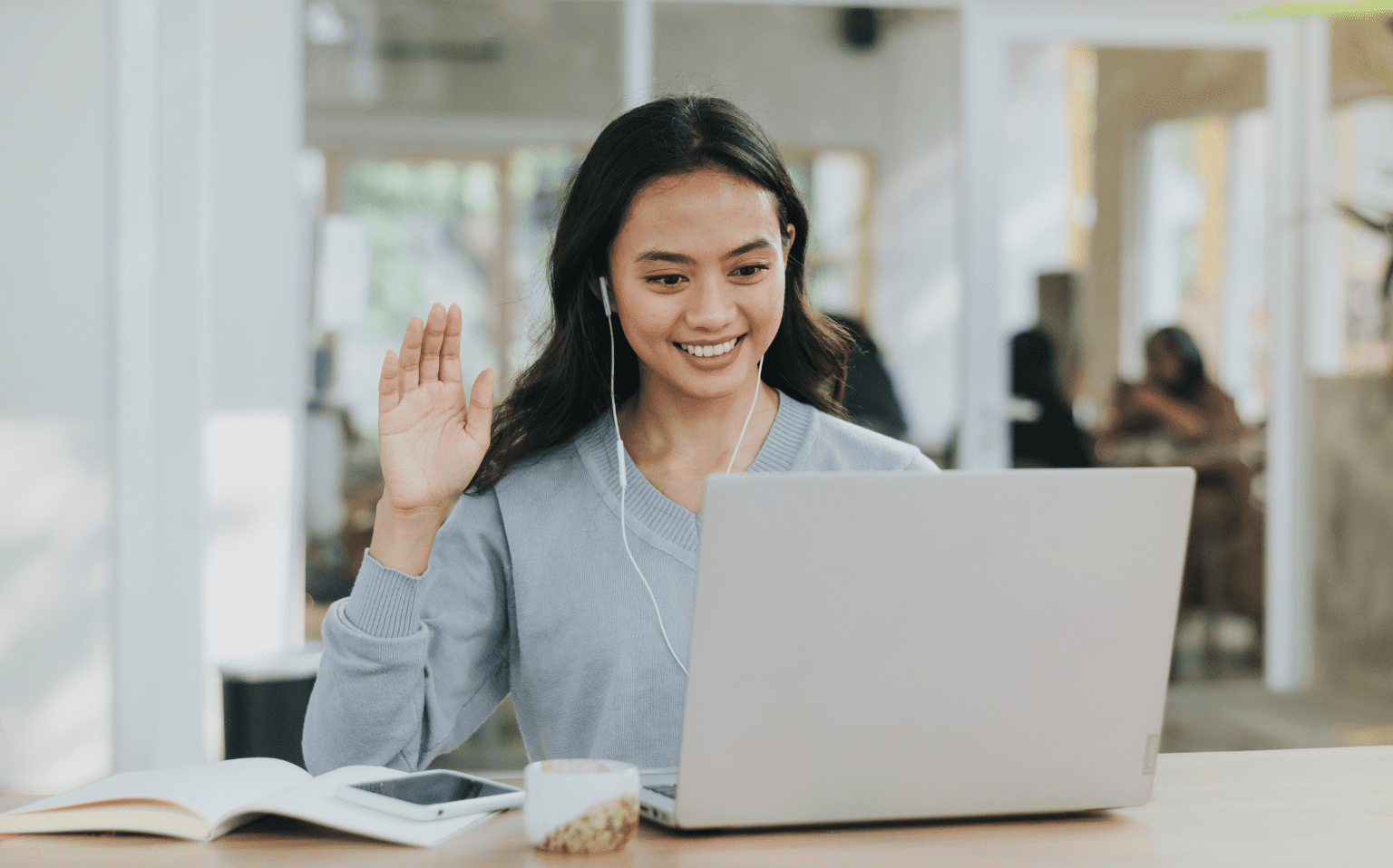 Woman looking at court reporter's transcript on laptop screen