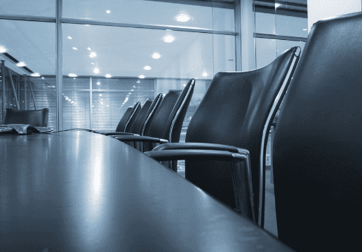 Deposition conference room space with table and chairs