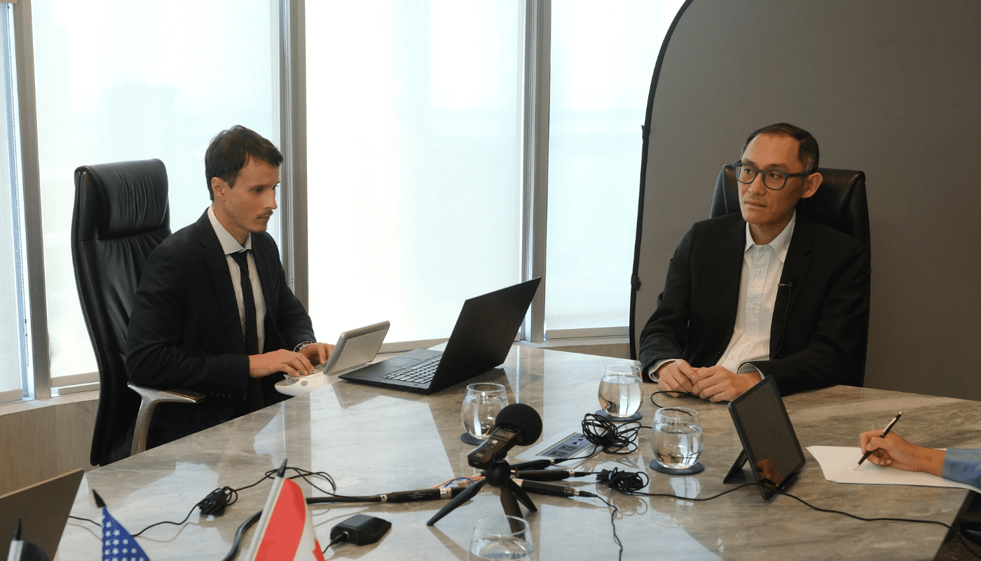 Stenographic court reporter types on stenomachine at deposition of witness